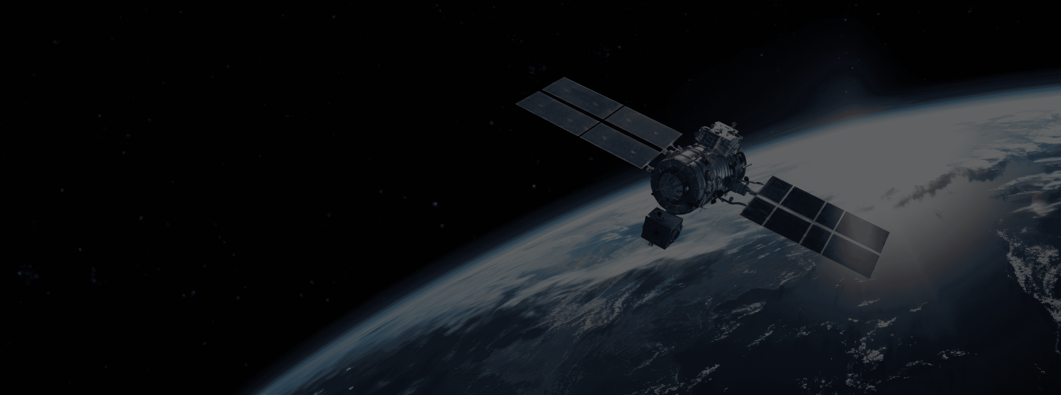 A communications satellite in orbit above Earth